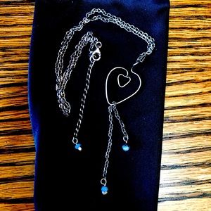 Jody Coyote Silver Wire Art necklace.